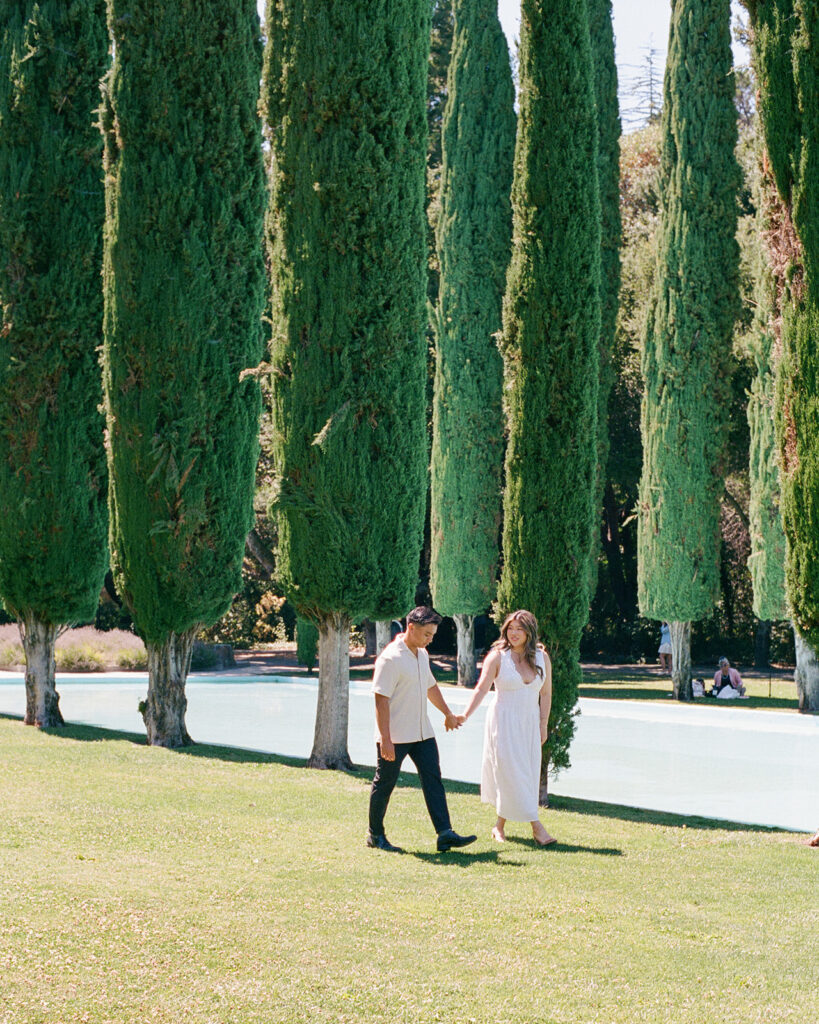Couple walking hand in hand at the Pulgas Water Temple