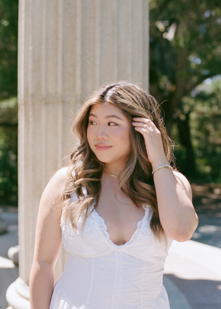 Bride to be posing with engagement ring at Pulgas water temple