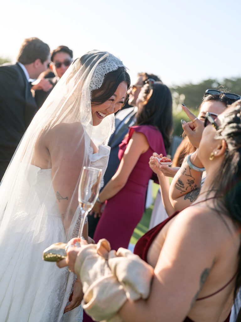 Bride and groom enjoying their cocktail hour with their guests during their San Francisco Bay Area wedding