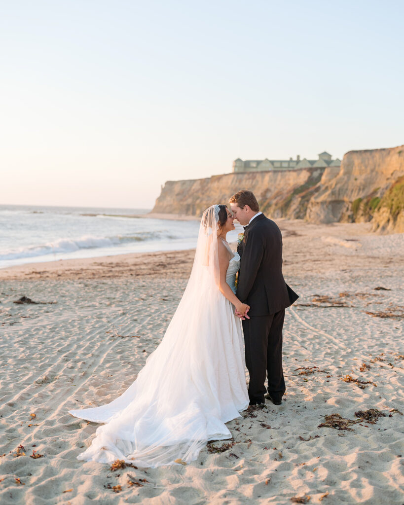 Bride and Groom during golden hour portraits at their Half Moon Bay wedding, with beautiful beachside views