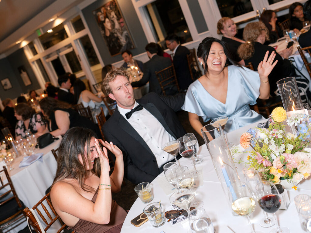Candid documentary frames during table toasts during san francisco bay area wedding