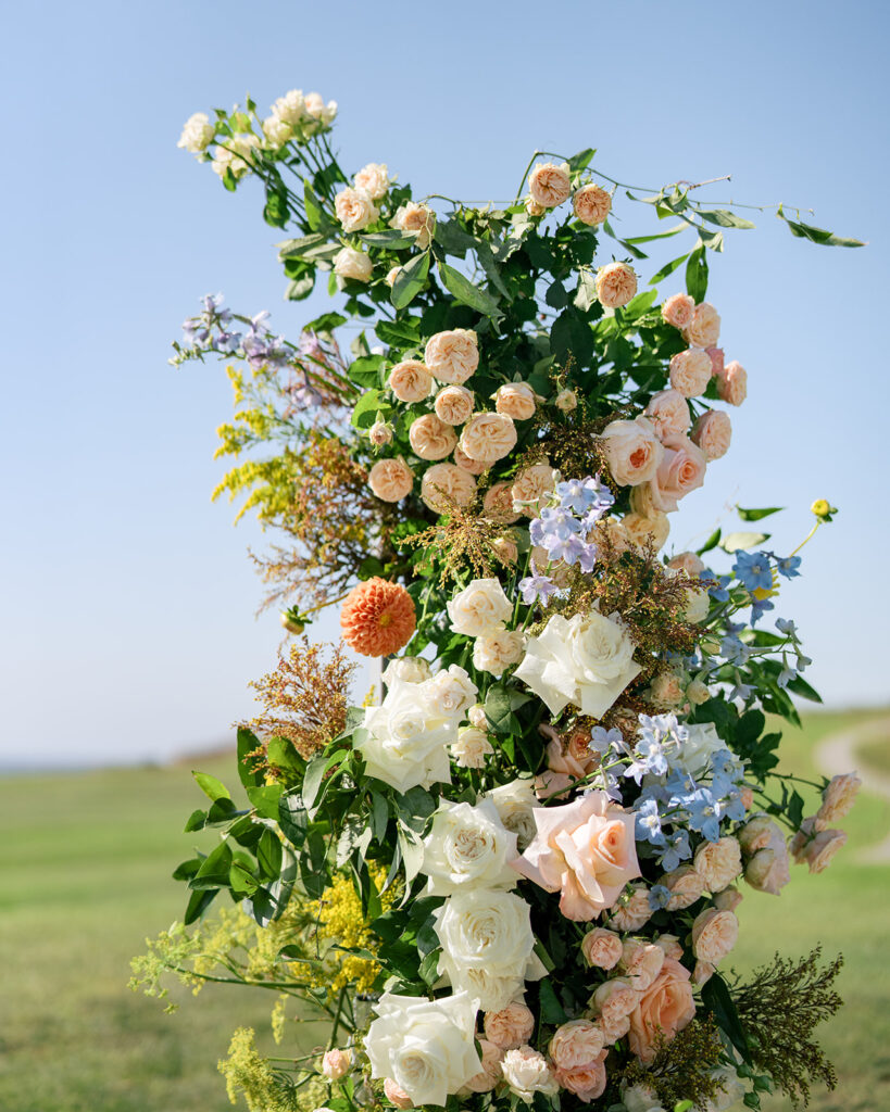 Ceremony arch detail photo showing an elegant colorful palette, by San francisco wedding photographer