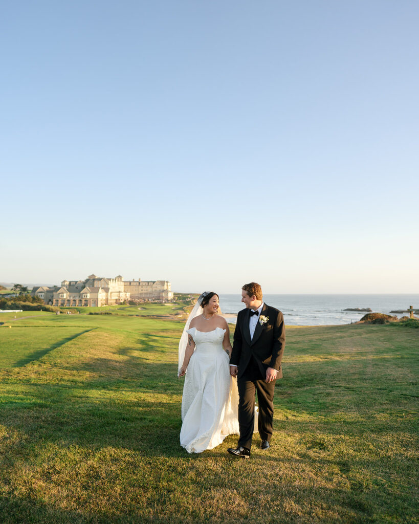 Bride and groom during golden hour portraits in front of the Ritz Carlton in Half Moon Bay