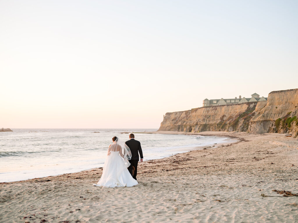 Bride and Groom during golden hour portraits at their Half Moon Bay wedding with beautiful beach views and shoreline