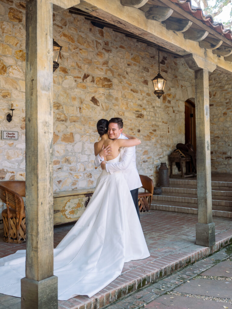 First look with the bride and groom at the Holman ranch inner courtyard