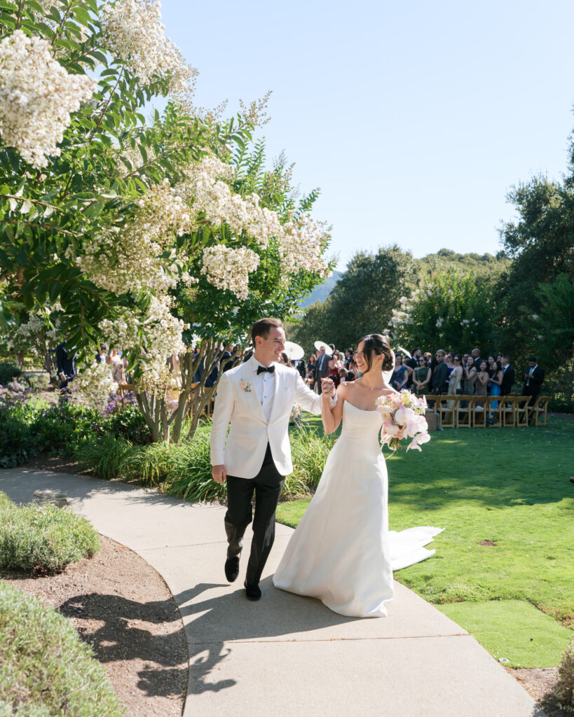Bride and groom joyful recessional