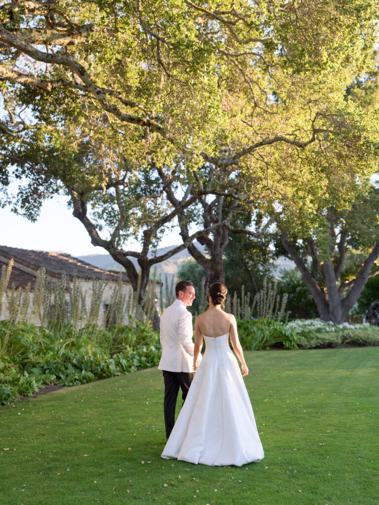 Bride and groom sneak away for sunset photos at Holman Ranch, a Carmel wedding venue