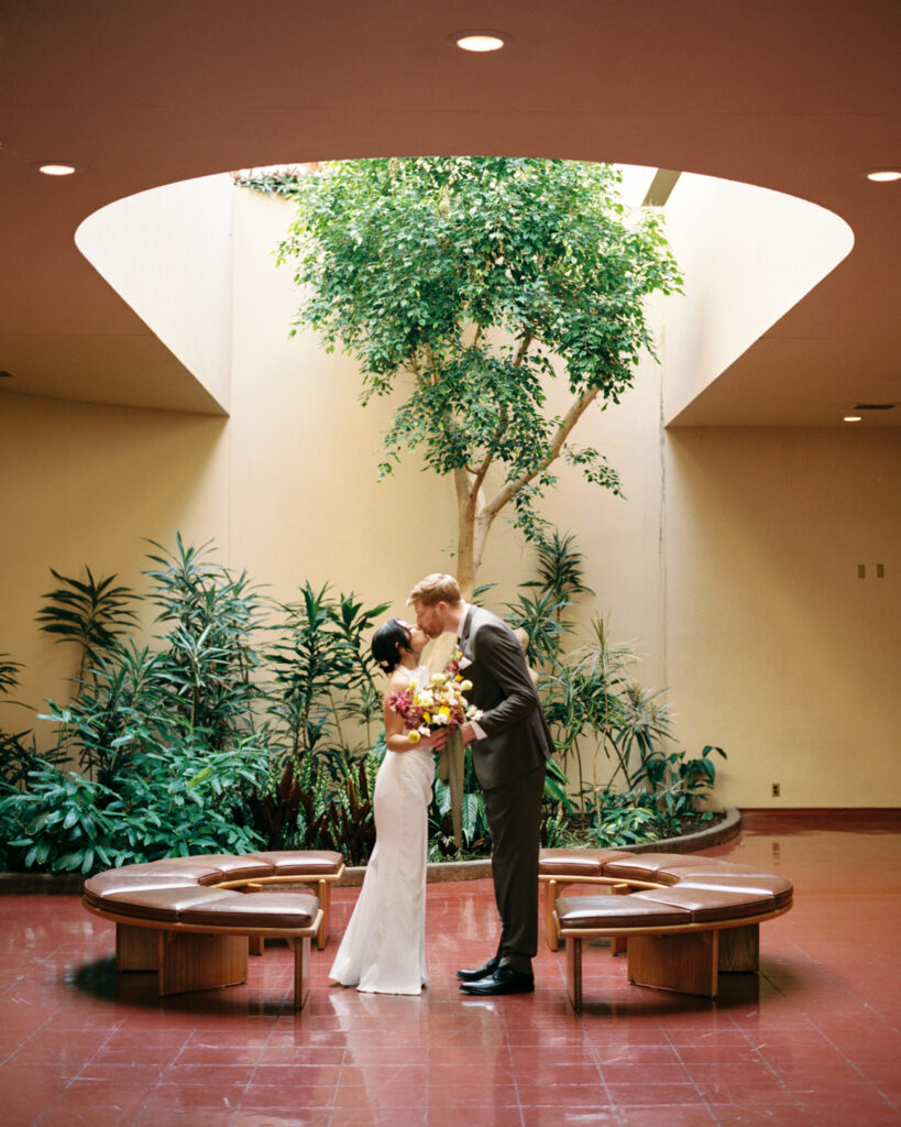 Bride and Groom share first kiss at their ceremony at the Marin County Civic Center